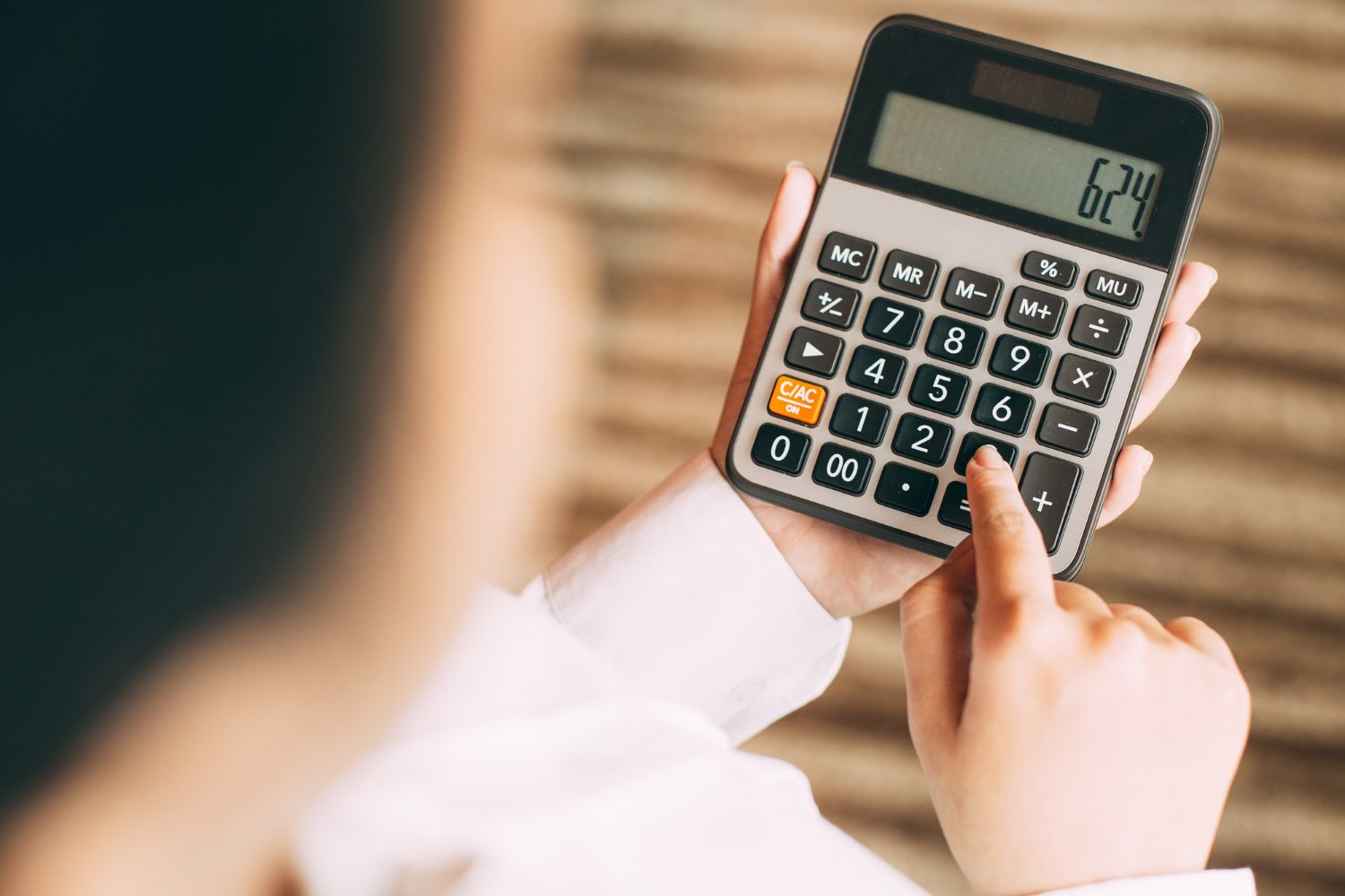 A woman using calculator