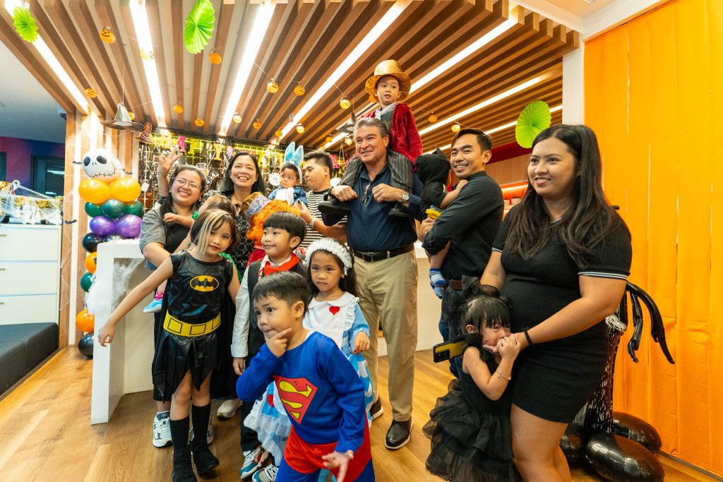  Santos Knight Frank's employees and their kids dressed in creative Halloween costumes